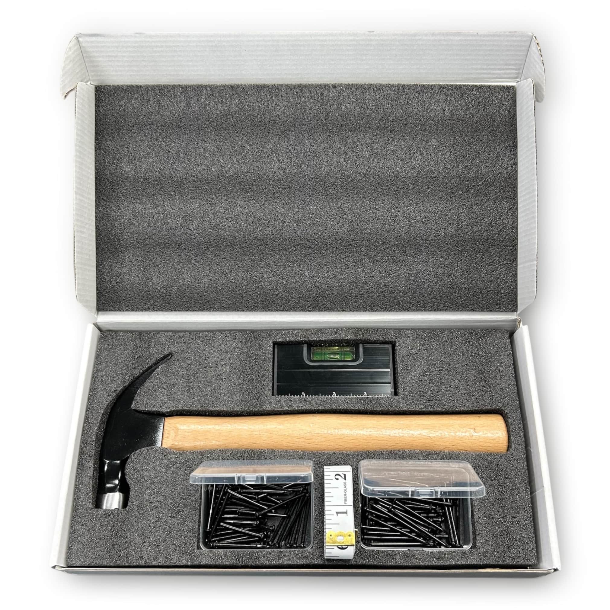 Five piece 16 oz. hammer gift set with beech handle hammer, nails, tape measure and level in a white gift box — custom engraved closing gift by Solano Laser Craft