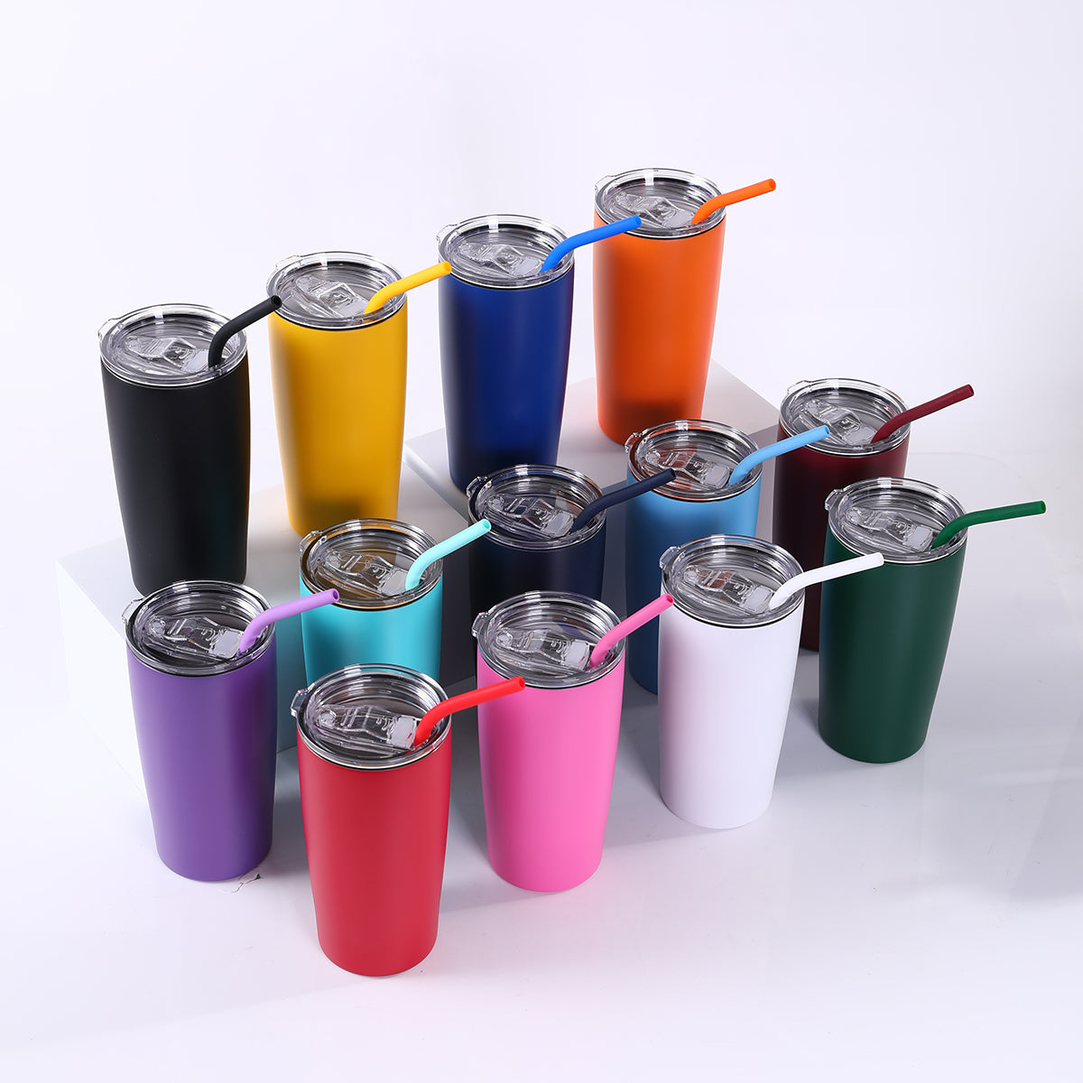 Row of powder coated 20 oz. Classic Tumblers in assorted colors — custom engraved tumblers by Solano Laser Craft