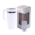White 20 oz. classic tumbler with a rainbow plated handle, shown with its gift box