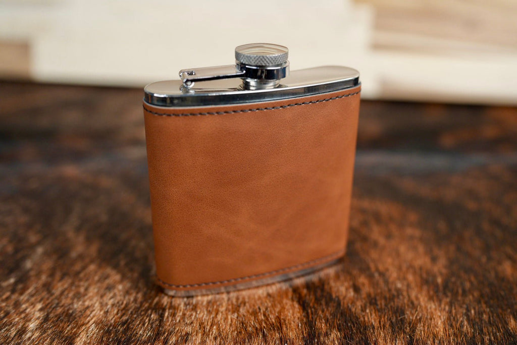 Walnut leatherette hip flask in a medium chocolate brown with a stainless steel cap