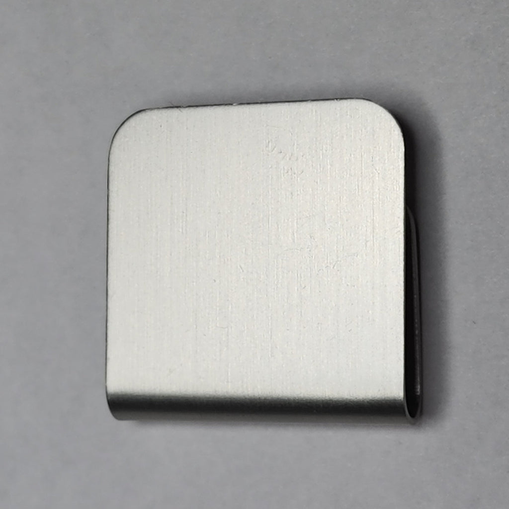 Silver magnetic hat clip with a removable golf ball marker