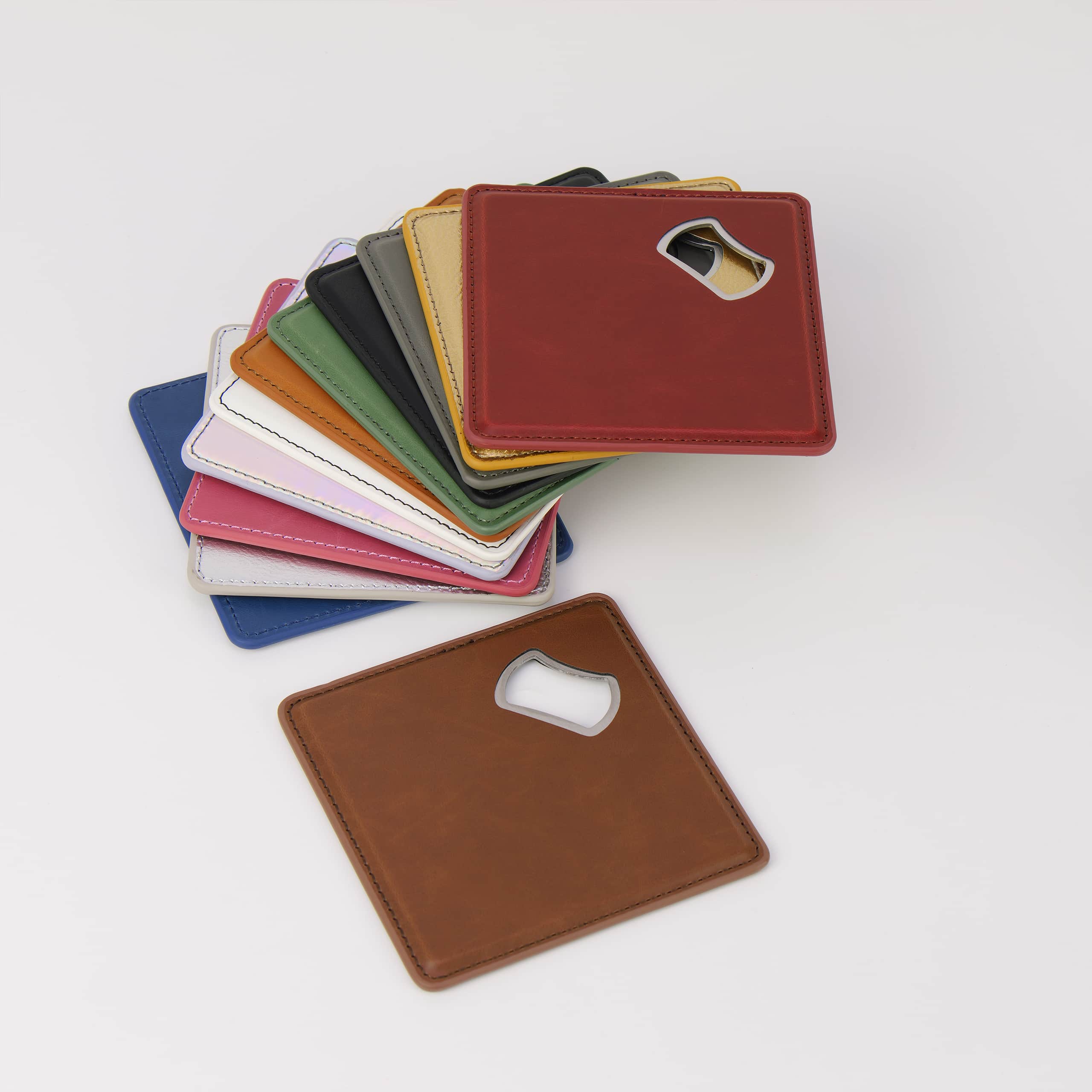 Leatherette coaster with a built-in stainless steel bottle opener — custom engraved bottle opener coaster by Solano Laser Craft