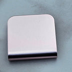 Light pink magnetic hat clip with a removable golf ball marker