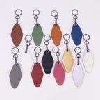 Leatherette motel keychains in twelve colors — custom engraved key fobs by Solano Laser Craft