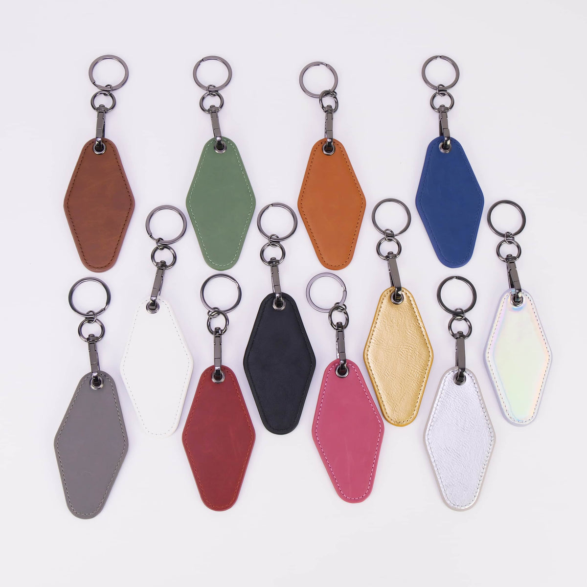 Leatherette motel keychains in twelve colors — custom engraved key fobs by Solano Laser Craft