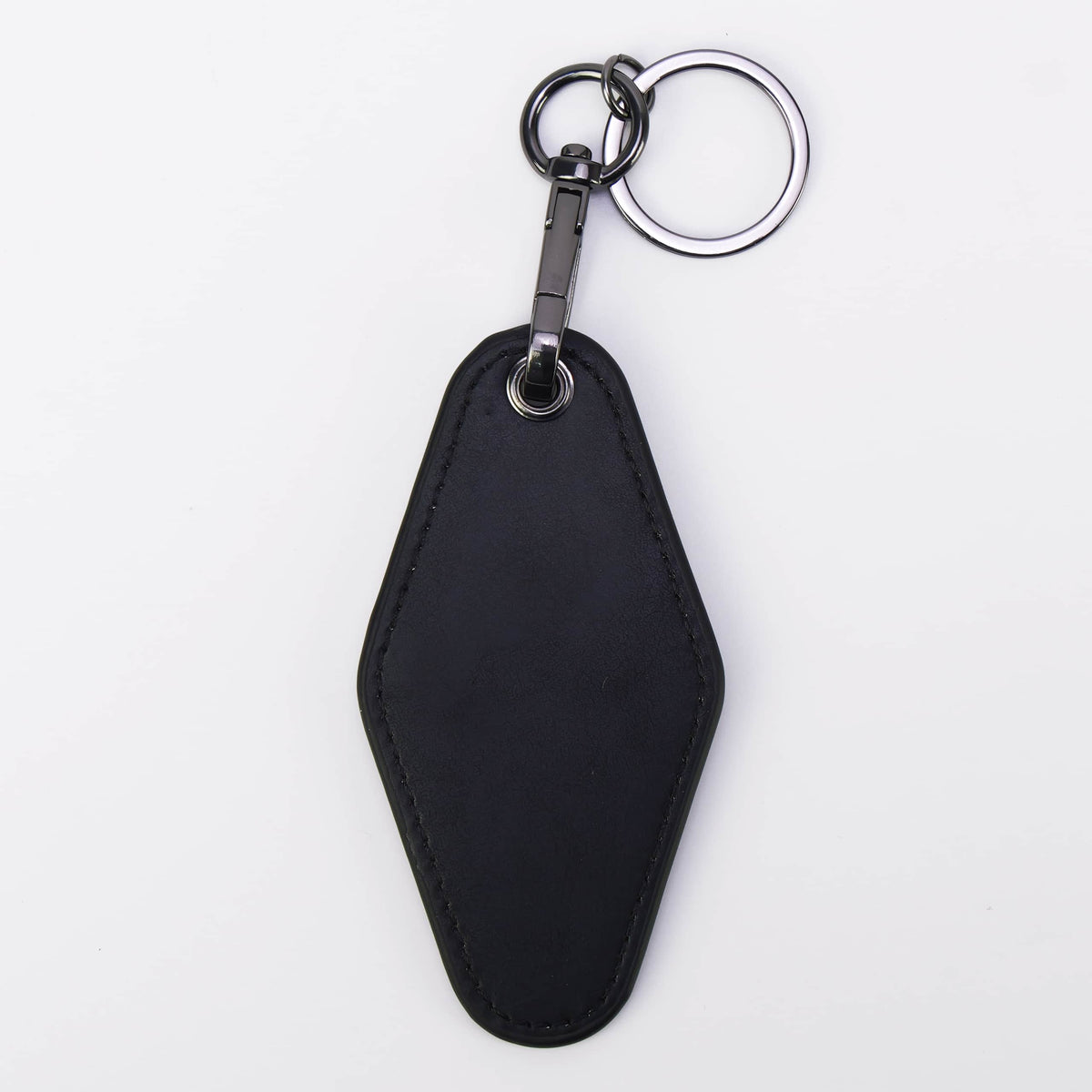 Black leatherette motel keychain with split key ring — custom engraved key fob by Solano Laser Craft