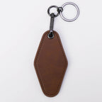 Brown leatherette motel keychain with a swivel clip and split ring