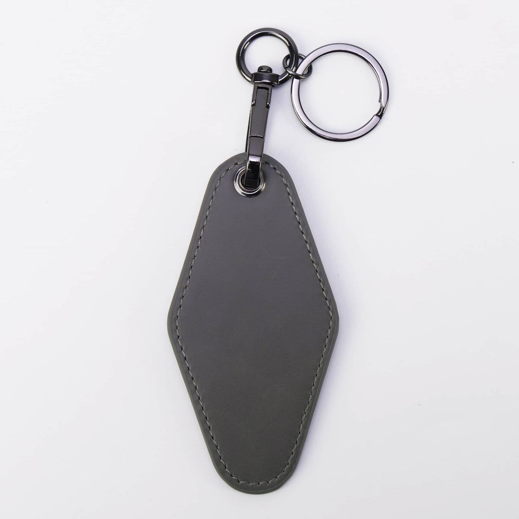 Gray leatherette motel keychain with a swivel clip and split ring