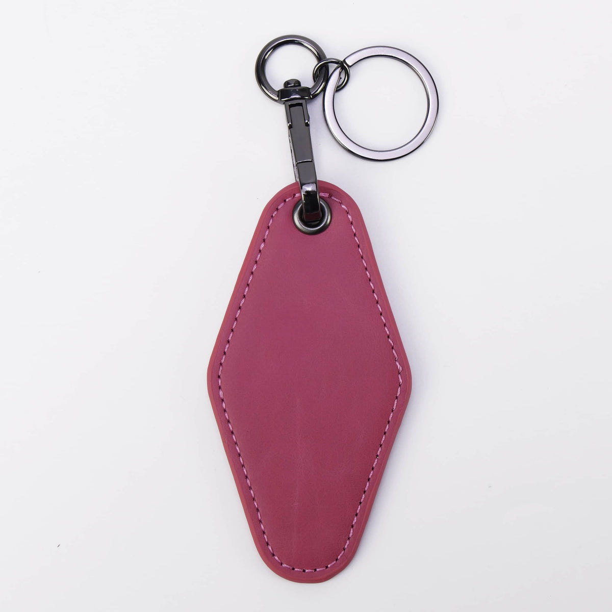 Pink leatherette motel keychain with a swivel clip and split ring