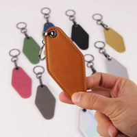 Rawhide leatherette motel keychain with split key ring — custom engraved key fob by Solano Laser Craft