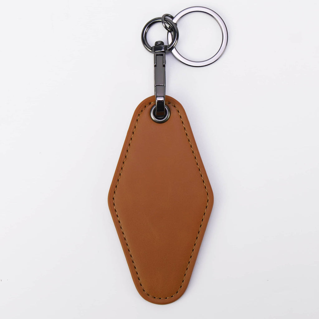 Rawhide leatherette motel keychain with a swivel clip and split ring