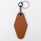 Rawhide leatherette motel keychain with a swivel clip and split ring