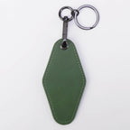 Sage green leatherette motel keychain with a swivel clip and split ring