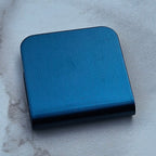 Steel blue magnetic hat clip with a removable golf ball marker