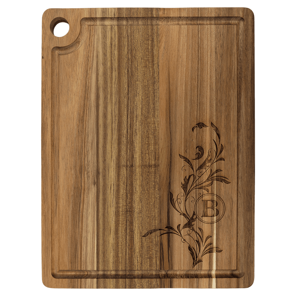 Acacia cutting board with juice groove, engraved with a floral vine and B monogram