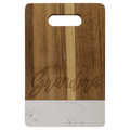 Small acacia cutting board with white marble band and cut-out handle, engraved on the wood