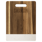 Medium acacia cutting board with white marble band, engraved family name on the wood