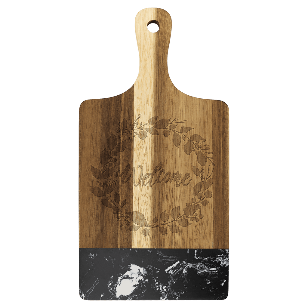 Paddle shaped acacia board with black marble band and engraved wreath design