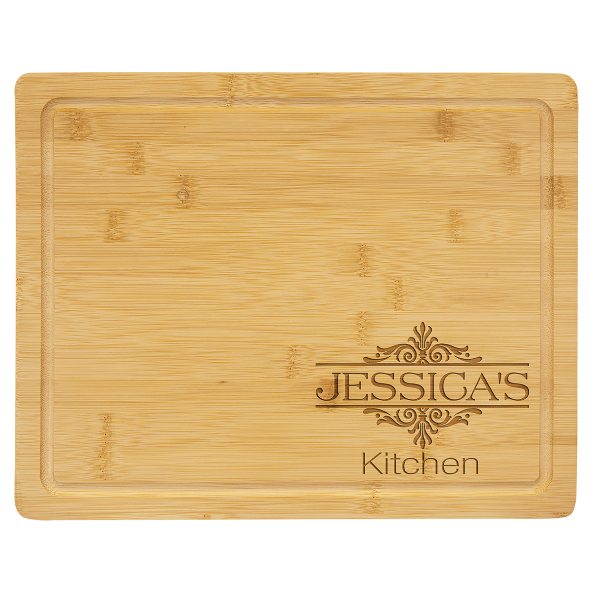 Bamboo cutting board with juice groove engraved with 'Jessica's Kitchen'