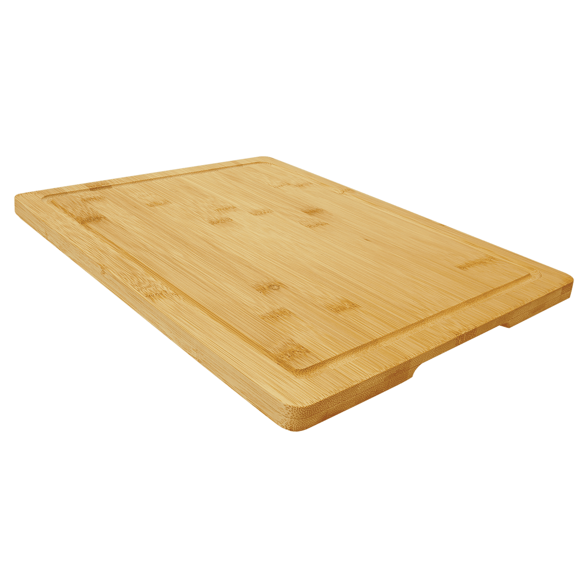 Angled view of a bamboo cutting board showing the depth of the juice groove