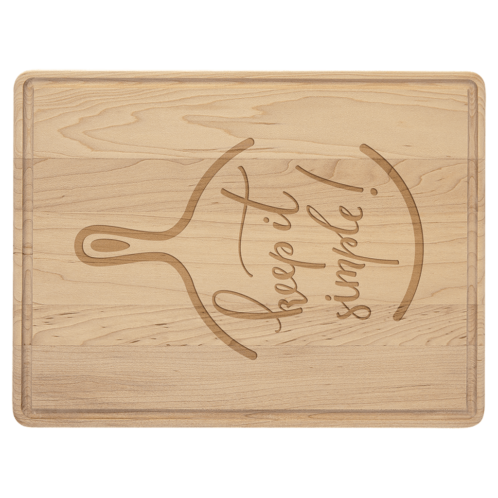 Maple cutting board engraved with 'keep it simple' and a spatula and skillet design