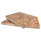Two maple butcher block cutting boards stacked, showing the 1 1/2 inch thickness