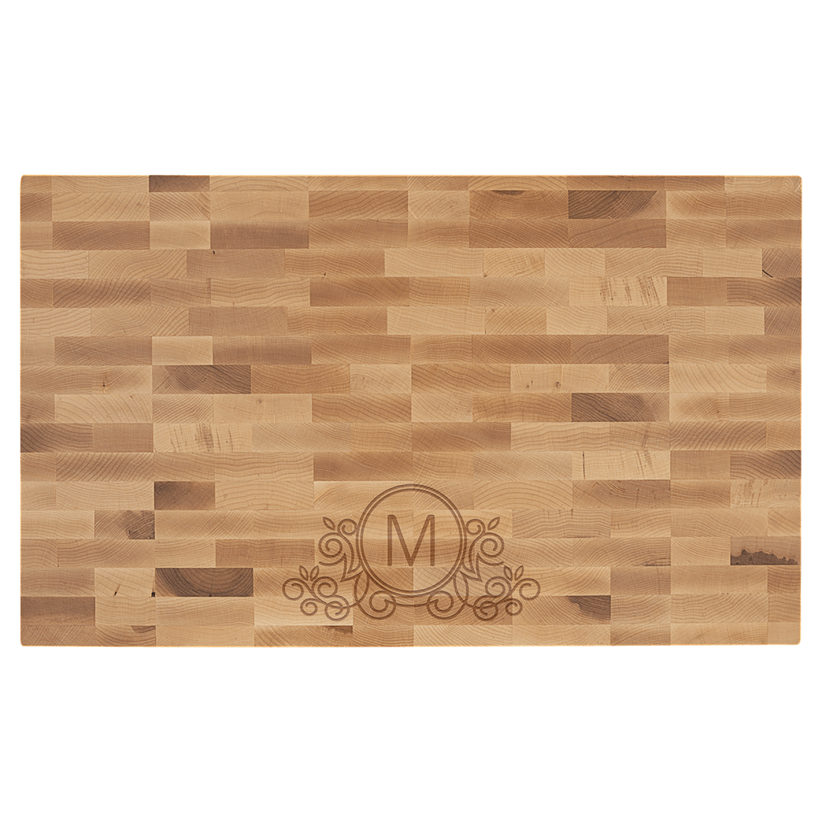Maple butcher block engraved with an M monogram and flourish