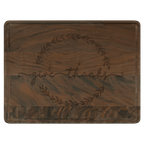 Walnut cutting board engraved with 'give thanks' inside a wreath