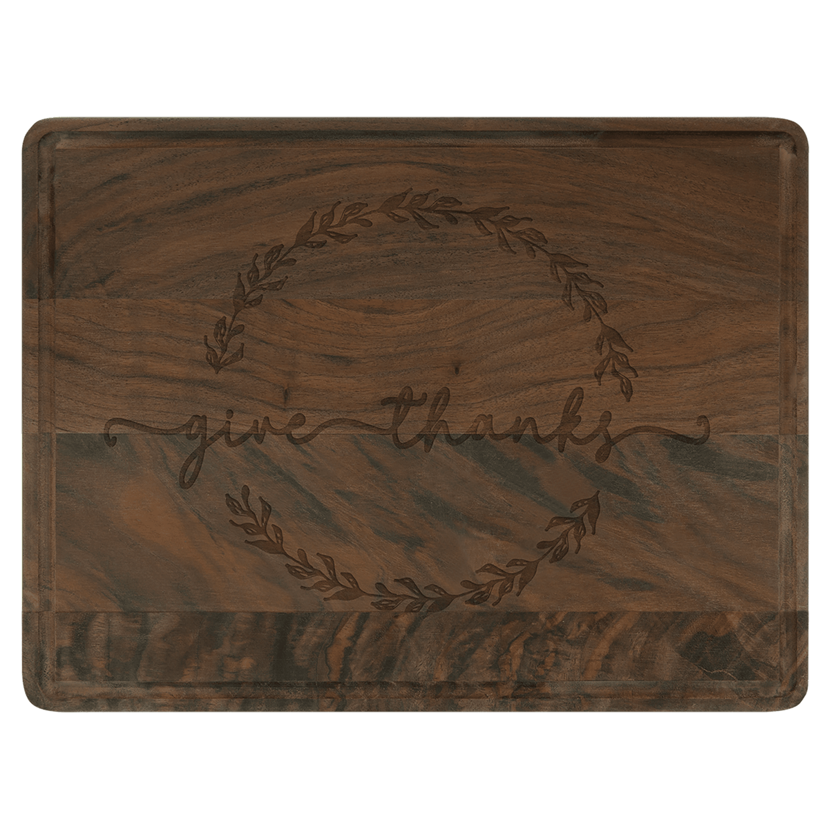 Walnut cutting board engraved with 'give thanks' inside a wreath