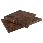 Two walnut butcher block cutting boards stacked, showing the thickness