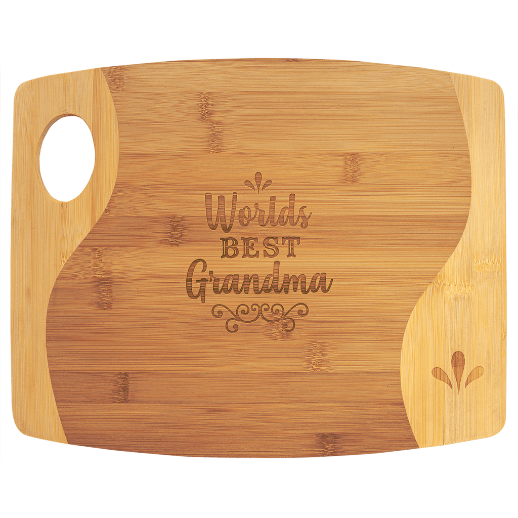 Two-tone bamboo cutting board engraved with 'World's Best Grandma'