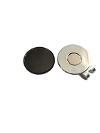 Black magnetic hat clip with a removable round golf ball marker, shown separated so both pieces are visible