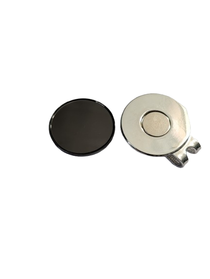 Black magnetic hat clip with a removable round golf ball marker, shown separated so both pieces are visible