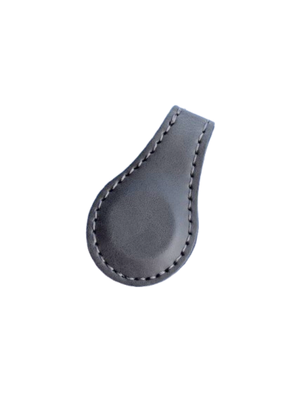 Gray leatherette magnetic bookmark with a stitched edge, shown folded over a page