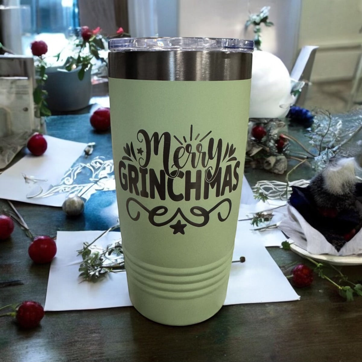 Sage green tumbler engraved Merry Grinchmas