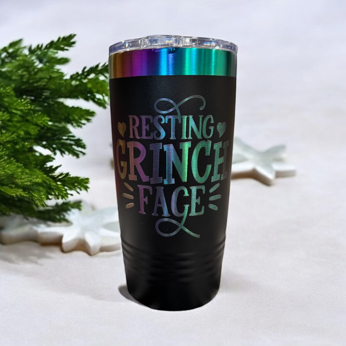 Black Prism tumbler engraved Resting Grinch Face in rainbow lettering