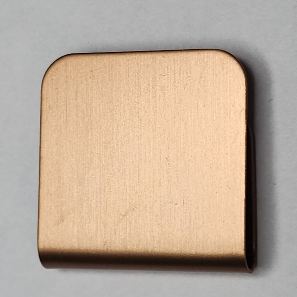 Rose gold magnetic hat clip with a removable golf ball marker