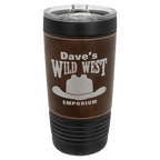 Black 20 oz. tumbler with a rustic brown leatherette wrap and clear slider lid, shown with a sample engraving