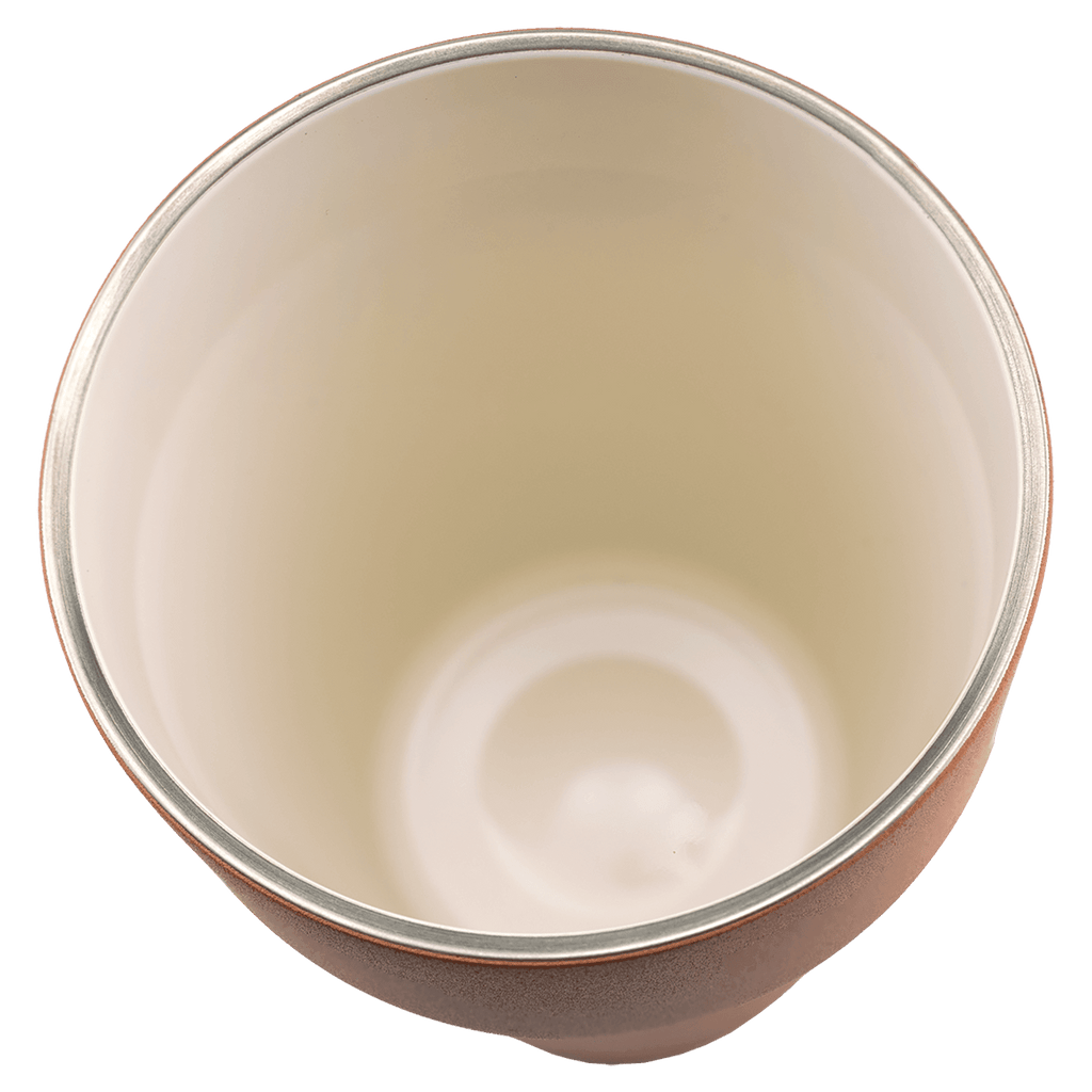 Looking inside the 13 oz. tumbler at its smooth cream ceramic lining