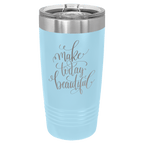 Light blue powder-coated 20 oz. ringneck tumbler with a stainless steel band and clear slider lid, shown with a sample engraving