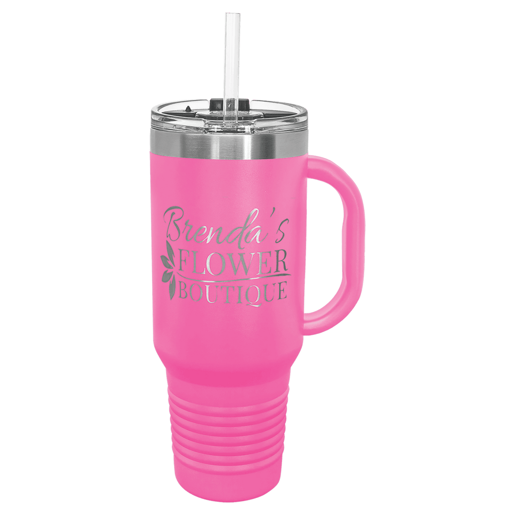 Pink powder-coated 40 oz. travel mug with a handle, straw and snap lid, shown with a sample engraving