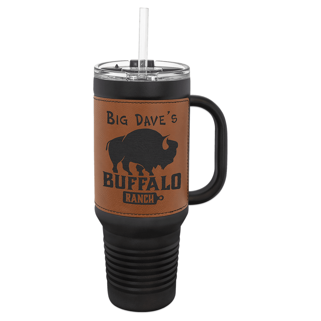 Black 40 oz. travel mug with a rawhide tan leatherette wrap, handle, straw and snap lid, shown with a sample engraving