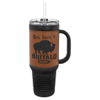 Black 40 oz. travel mug with a rawhide tan leatherette wrap, handle, straw and snap lid, shown with a sample engraving