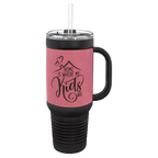 Black 40 oz. travel mug with a pink leatherette wrap, handle, straw and snap lid, shown with a sample engraving