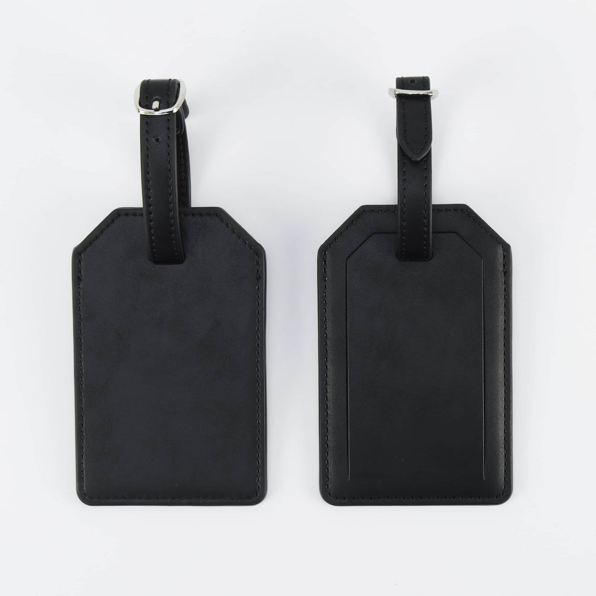 Black leatherette luggage tag, front and back, with buckle strap