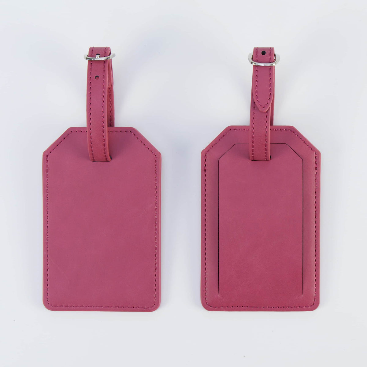 Pink leatherette luggage tag, front and back, with buckle strap