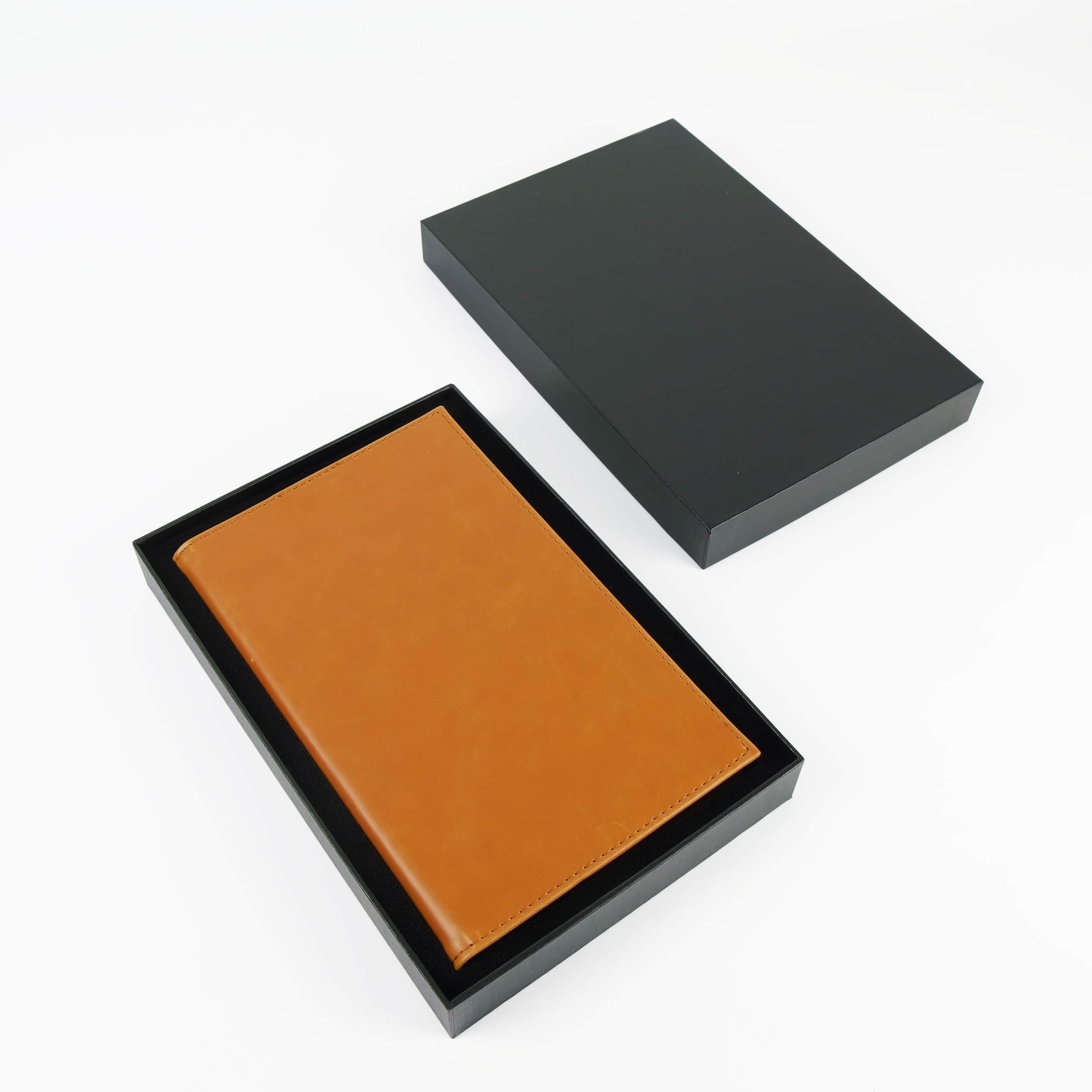 Rawhide tan leatherette journal in its open black gift box