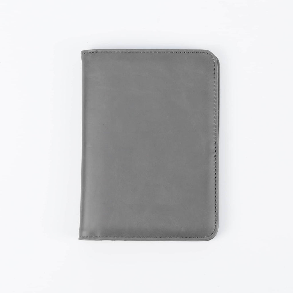 Gray leatherette passport wallet, closed front view