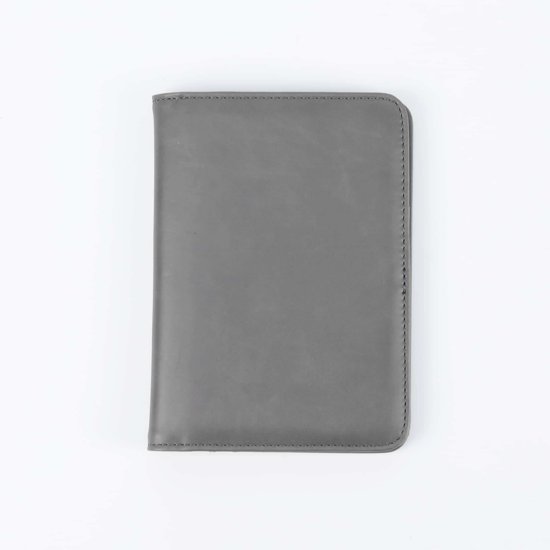 Gray leatherette passport wallet, closed front view