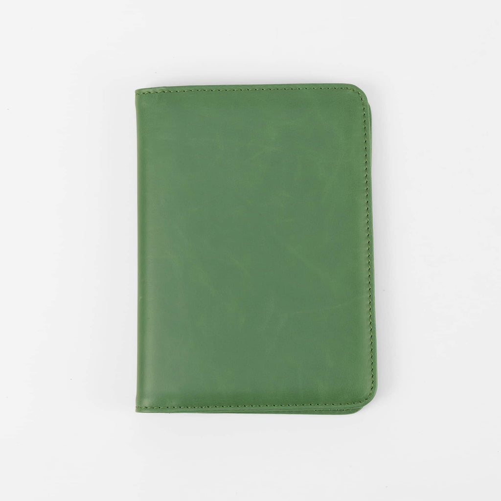 Sage green leatherette passport wallet, closed front view
